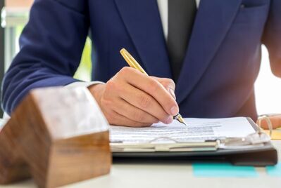 Lettings agent signing documents