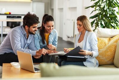 Three people having a meeting