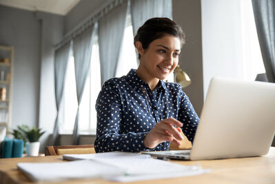 Someone looking at a computer