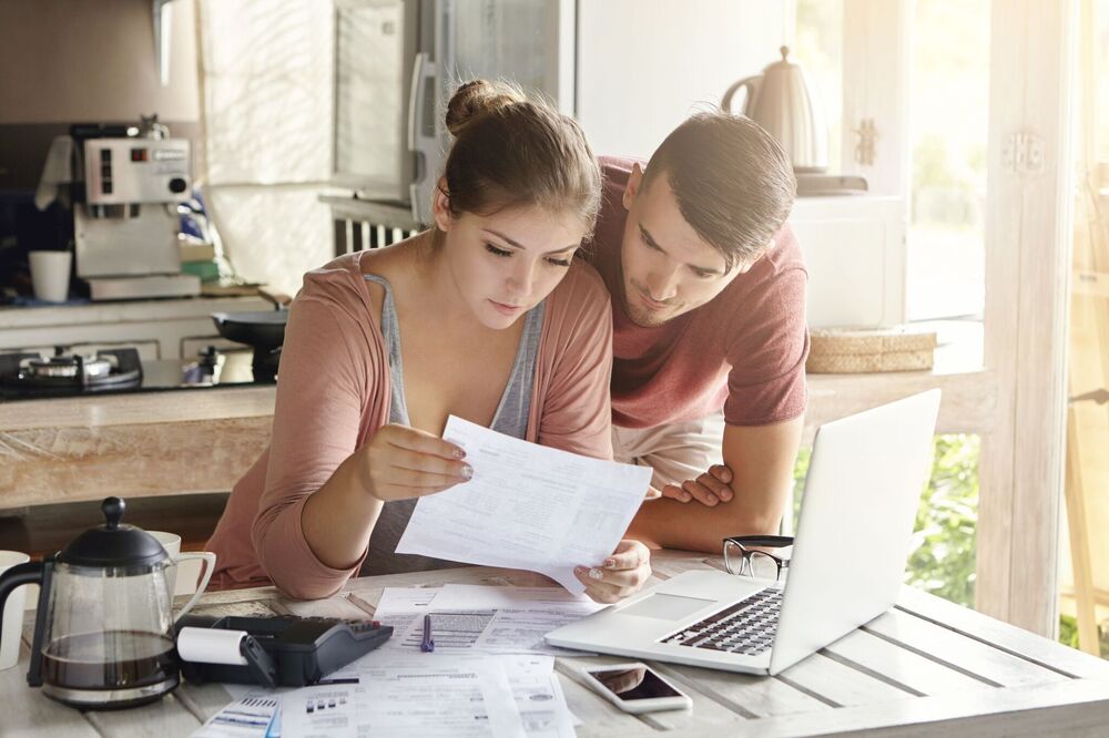 Couple looking at a laptop