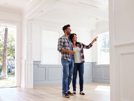 A couple looking around a house