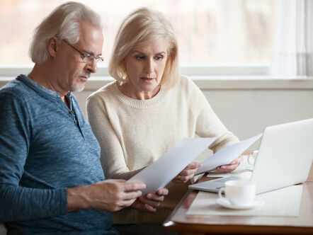 Man and woman looking at paperwork